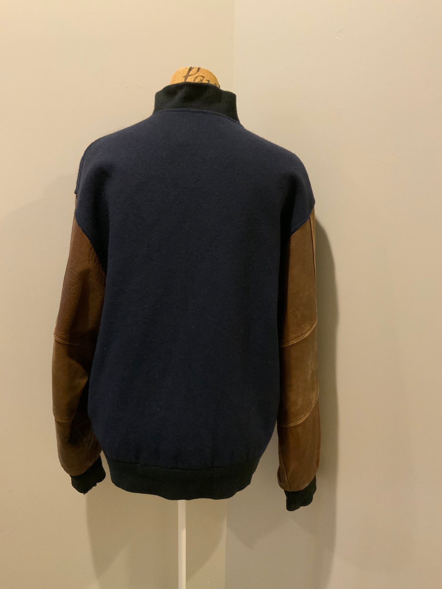 Kingspier Vintage - Ford F-Series 50 year anniversary letterman’s jacket in navy with brown leather sleeves, snap closures, slash pockets and an inside pocket.