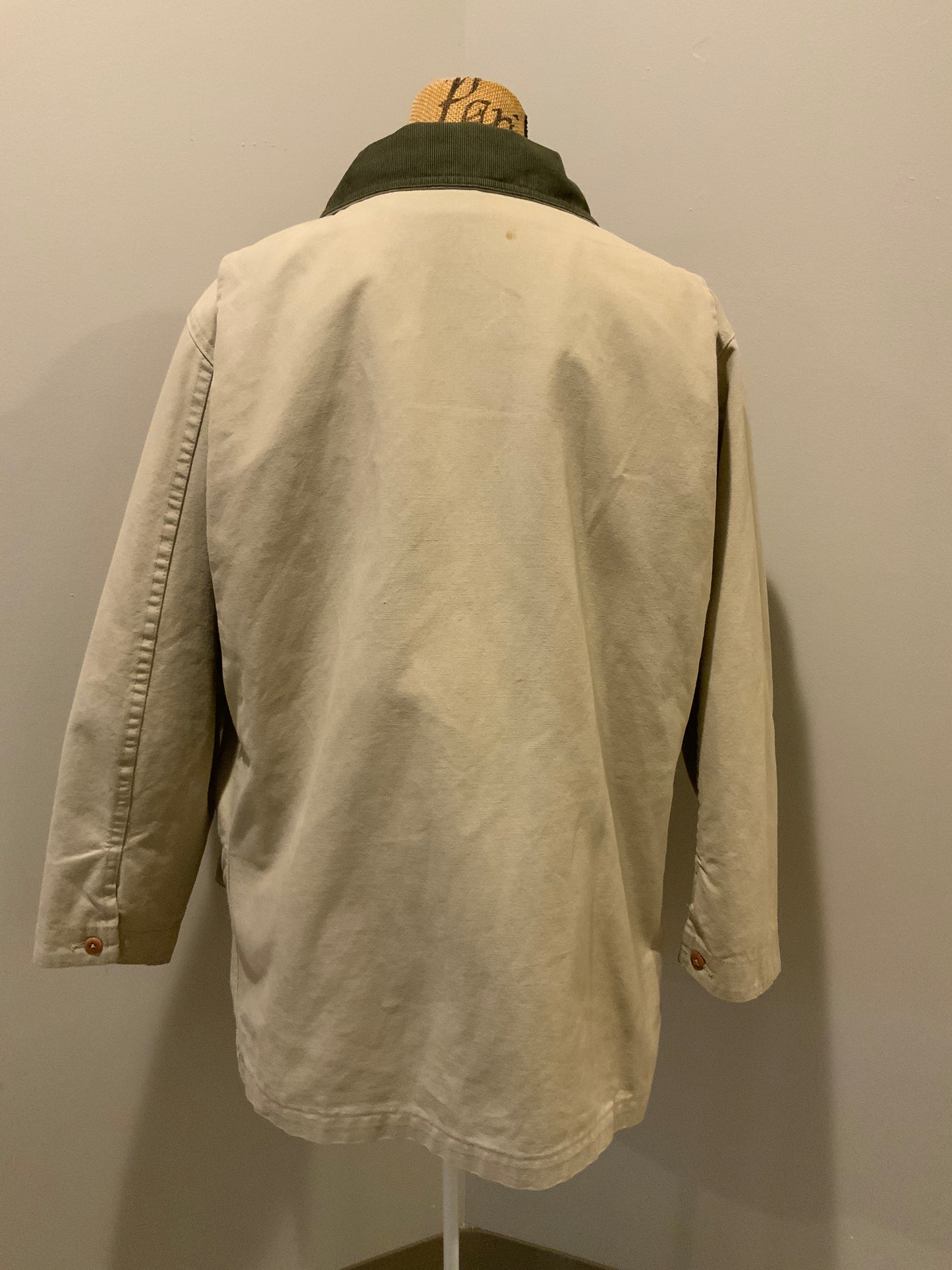Kingspier Vintage - L.L.Bean beige field jacket with green corduroy collar and cuff, four front patch pockets and one zip pocket, button closures, removable plaid "Prima Loft" synthetic down lining. Size large petite women’s.