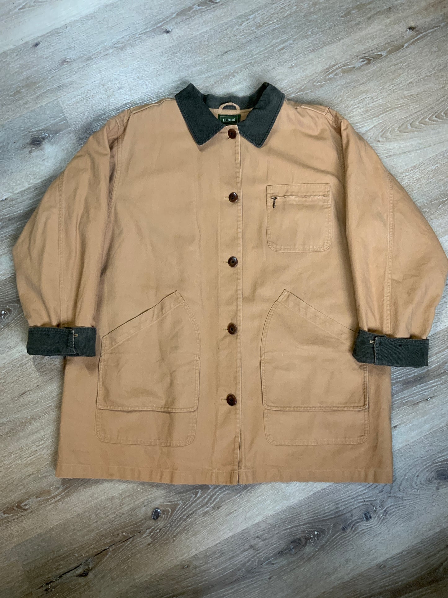 Kingspier Vintage - L.L.Bean tan field jacket with green corduroy collar and cuff, four front patch pockets button closures, removable plaid wool blend liner. Size 2XL women’s.