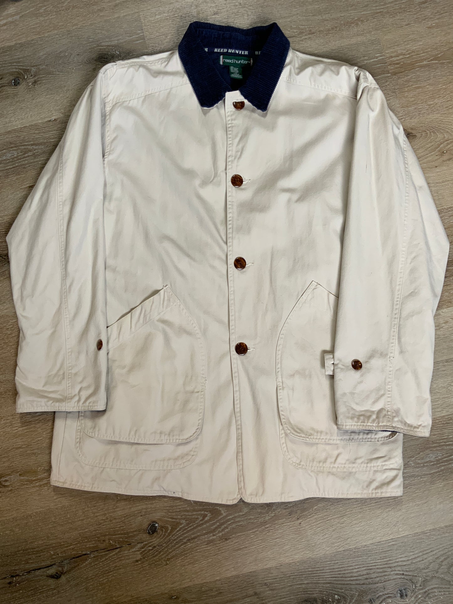 Kingspier Vintage - Reed Hunter beige field jacket with green corduroy collar and cuff, four front patch pockets,button closures, wool blend liner. Size medium men’s.