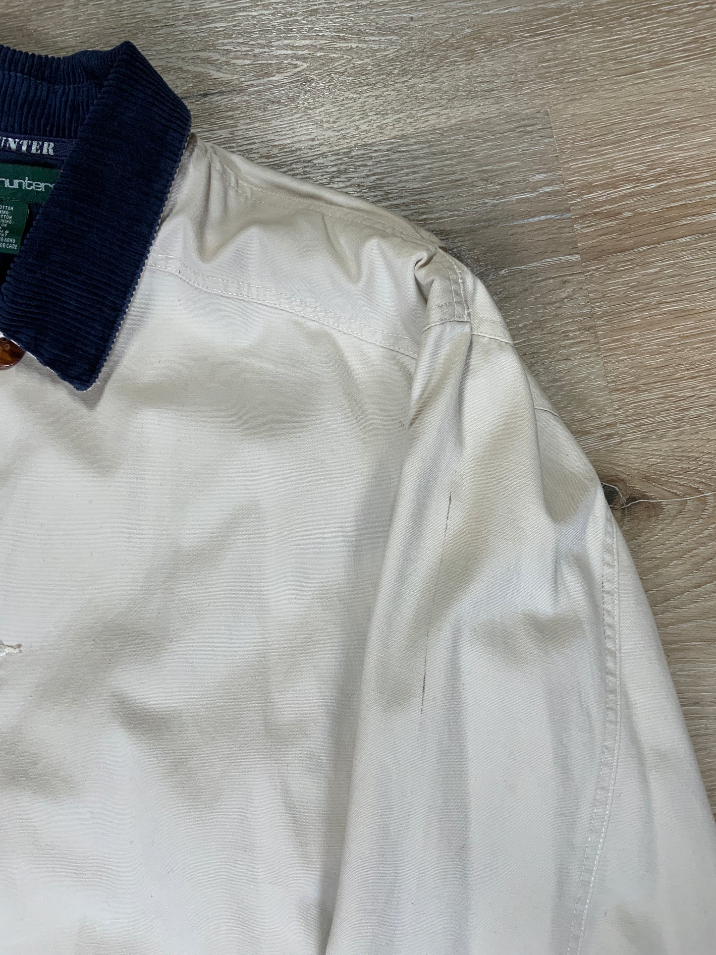 Kingspier Vintage - Reed Hunter beige field jacket with green corduroy collar and cuff, four front patch pockets,button closures, wool blend liner. Size medium men’s.