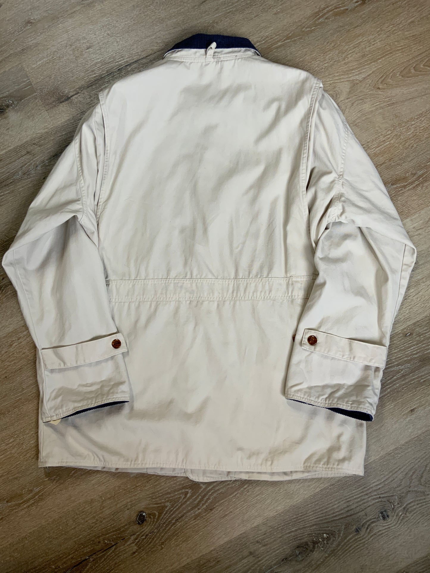 Kingspier Vintage - Reed Hunter beige field jacket with green corduroy collar and cuff, four front patch pockets,button closures, wool blend liner. Size medium men’s.