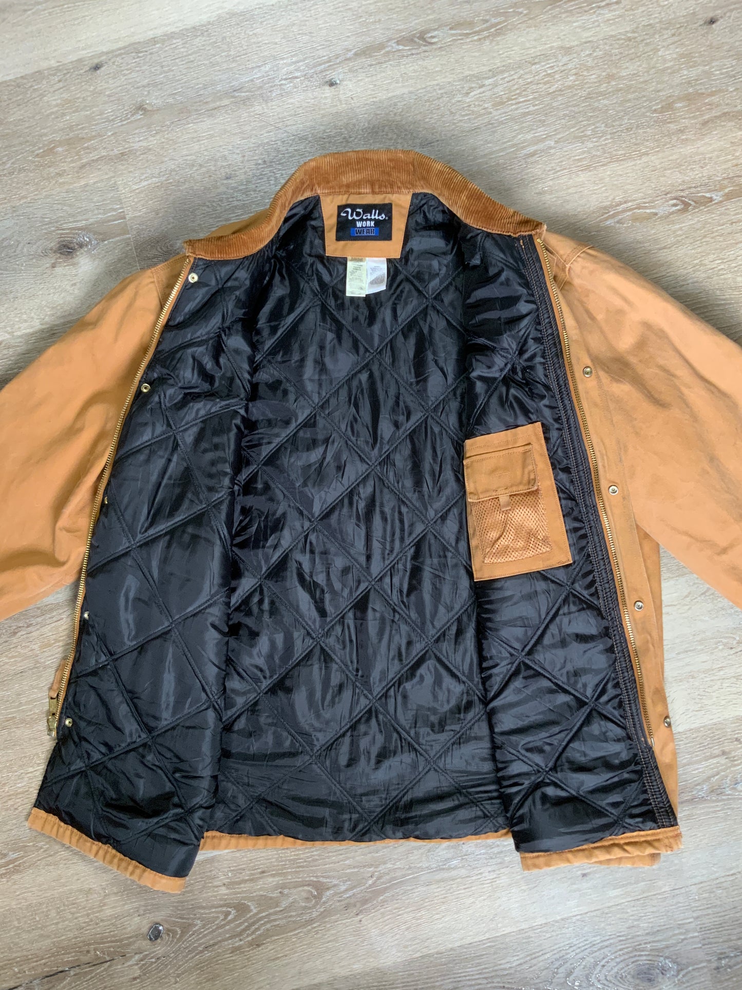 Kingspier Vintage - Wall’s Work Wear canvas work jacket with brown corduroy collar, zipper and snap closures, two front patch pockets and flap pockets, inside quilted lining with knit inside cuffs to keep the cold from getting in.