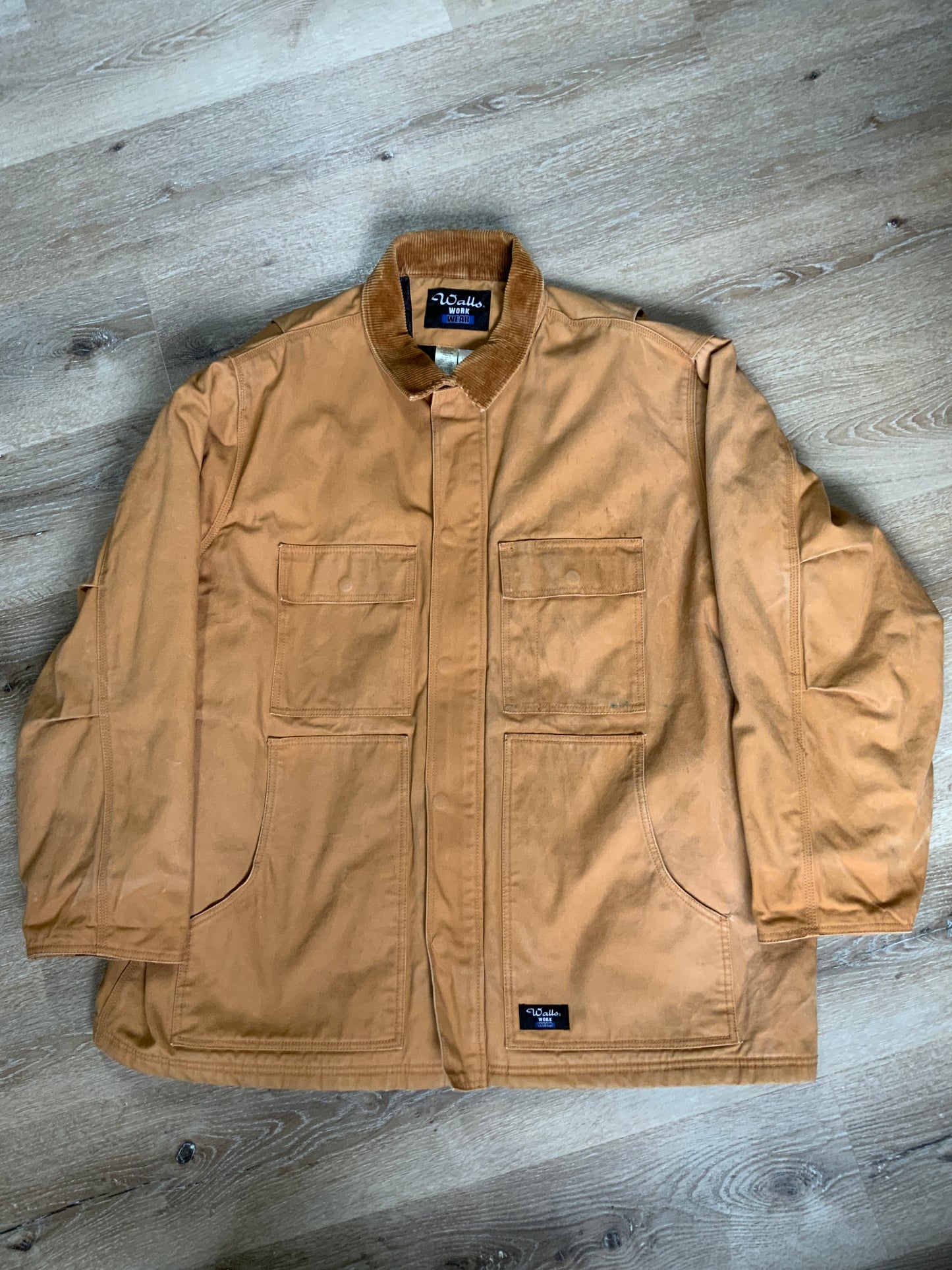 Kingspier Vintage - Wall’s Work Wear canvas work jacket with brown corduroy collar, zipper and snap closures, two front patch pockets and flap pockets, inside quilted lining with knit inside cuffs to keep the cold from getting in.