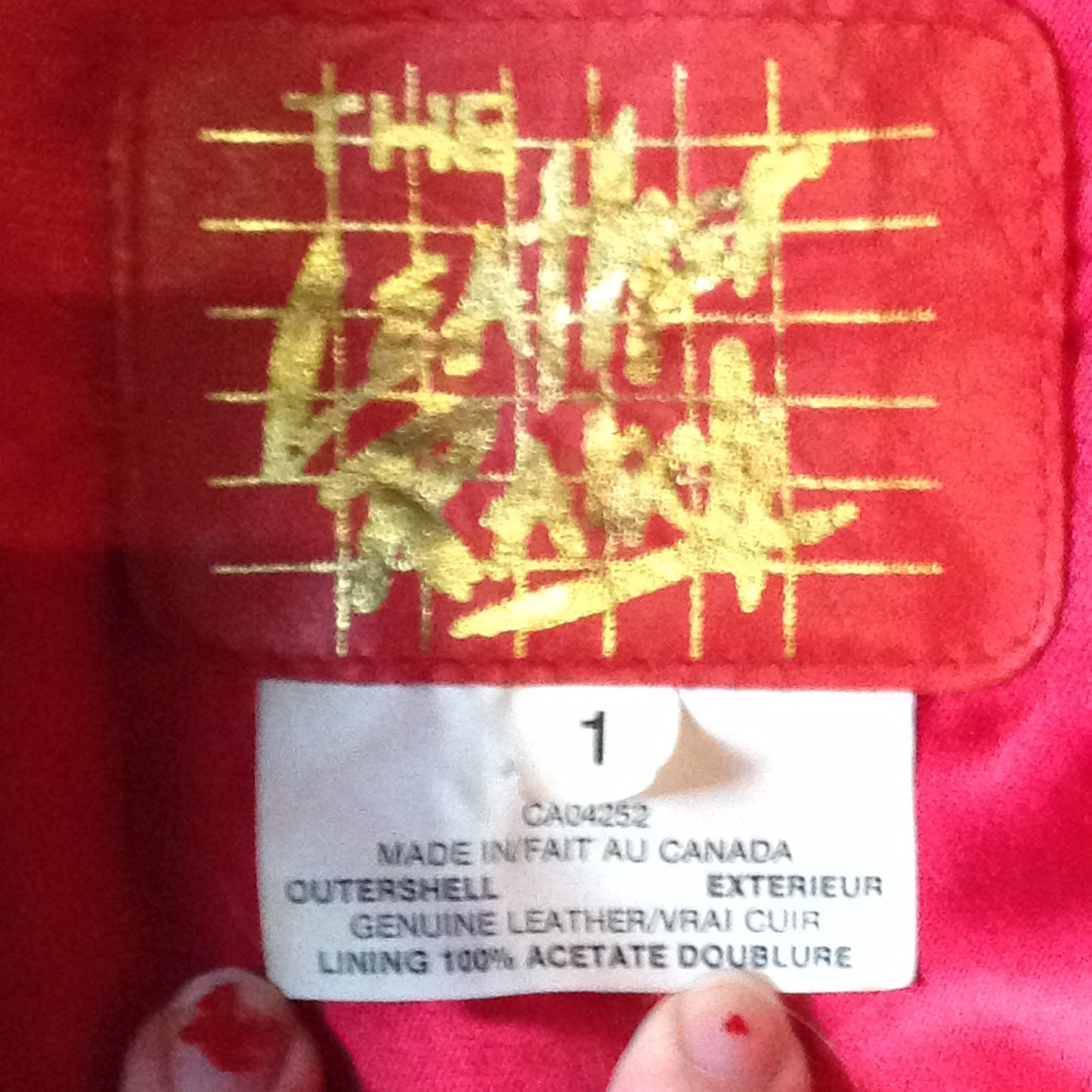 Kingspier Vintage - The Leather Ranch red fringe leather jacket with snap closures and red satin lining . Made in Canada, size XL.