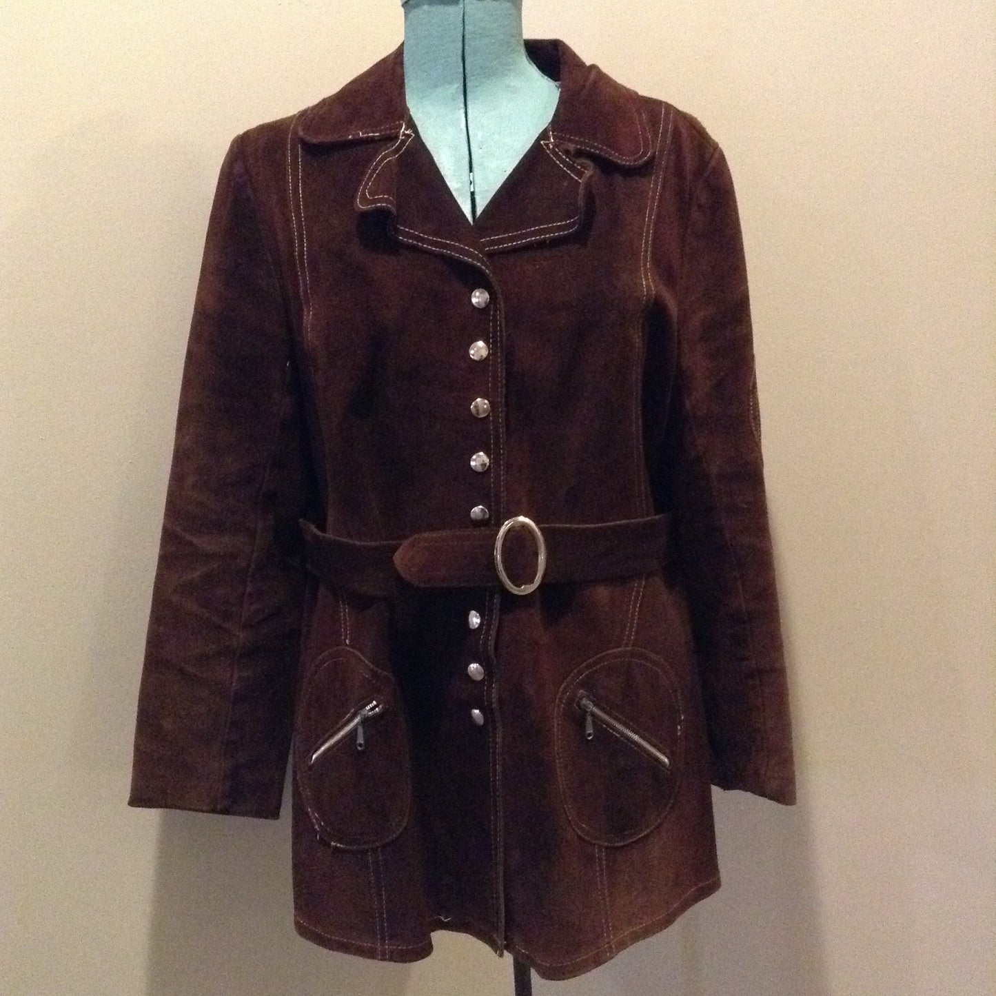 Kingspier Vintage - Vintage Sylvia Mark brown suede belted jacket with snap closures, decorative stitching, unique round pockets and pink satin lining. Made in Canada. Size Medium.