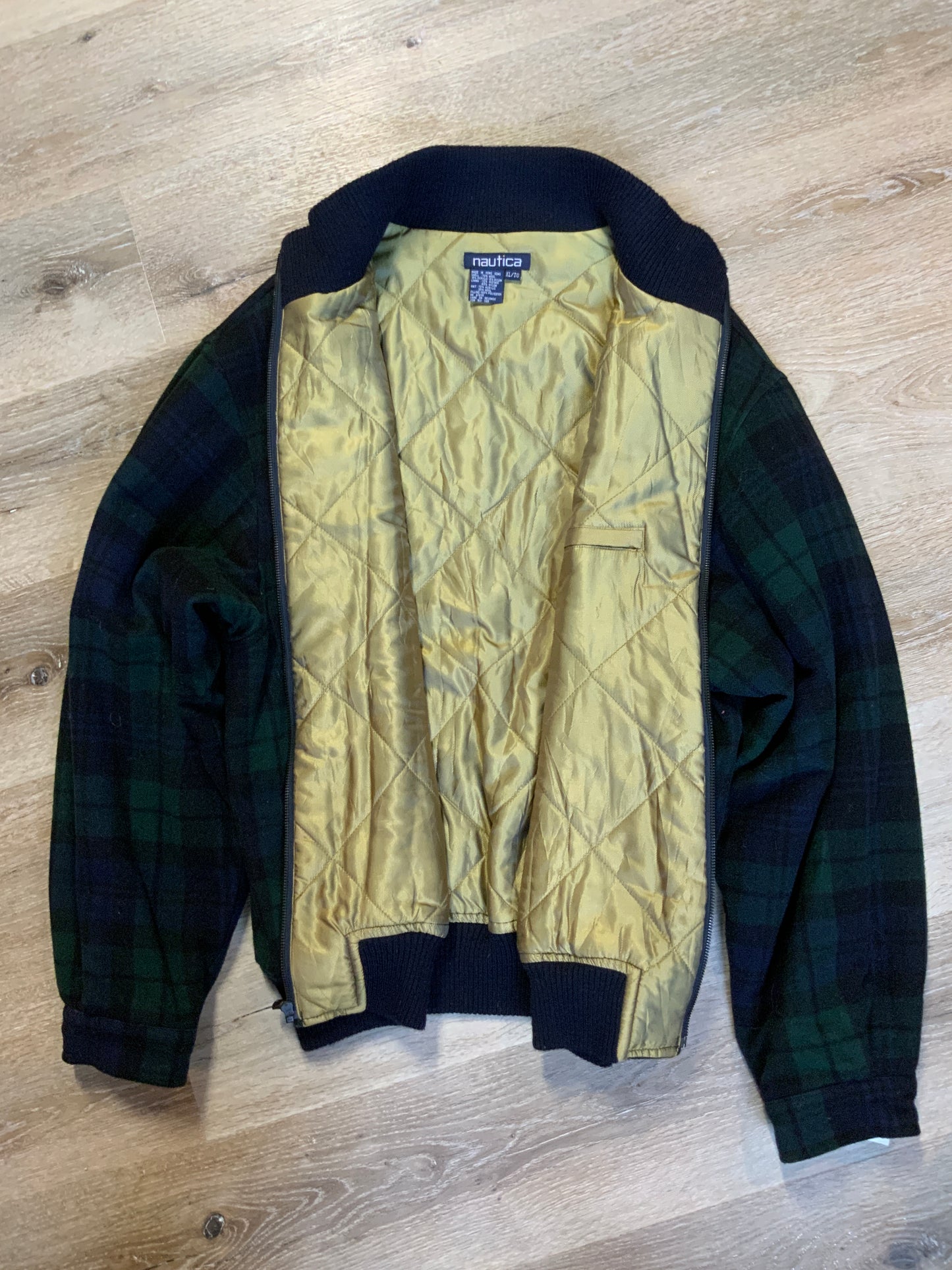 Kingspier Vintage - Nautica green and black “black watch” tartan wool jacket with knit trim collar, zipper, slash pockets and quilted lining. Size XL.