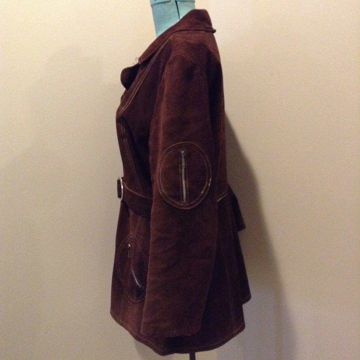 Kingspier Vintage - Vintage Sylvia Mark brown suede belted jacket with snap closures, decorative stitching, unique round pockets and pink satin lining. Made in Canada. Size Medium.