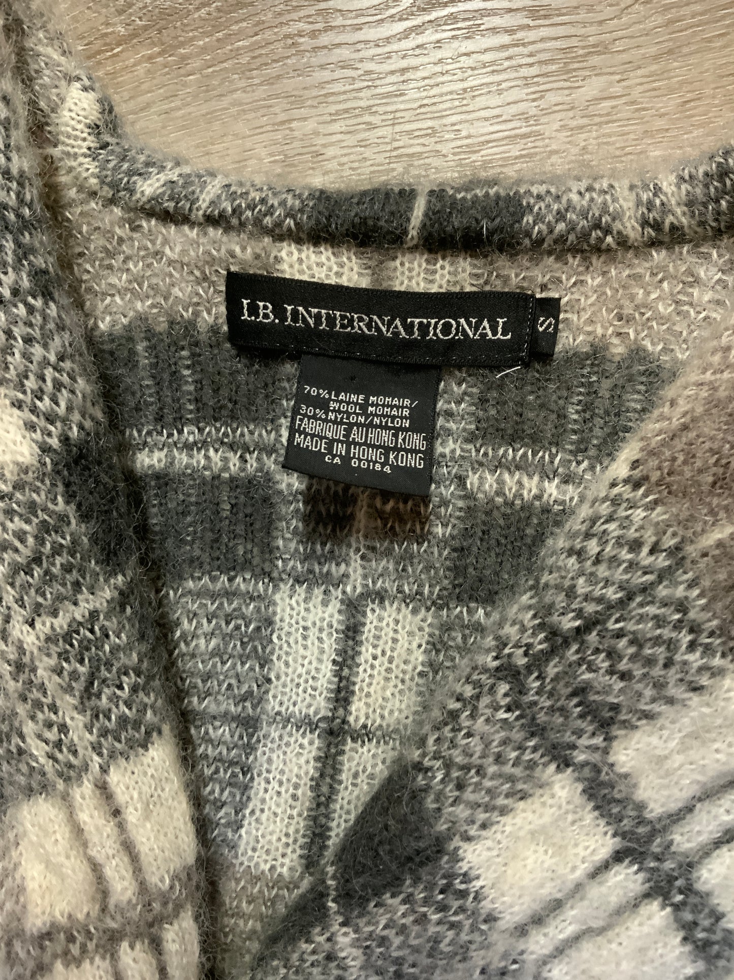 Kingspier Vintage - L.B. International Grey and white plaid mohair sweater coat with button closure, welt pockets and a shawl collar