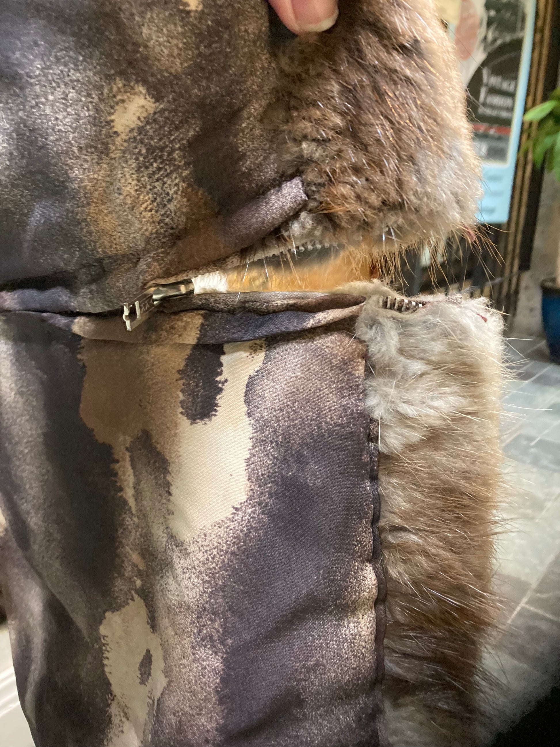 Kingspier Vintage - Vintage 70’s Mitchell Fur Co. Fur Coat features an exaggerated fur collar, double breasted button closures, D,A,P monogram and a bottom portion that zips off to give the option of a shorter jacket.
Made in Canada.