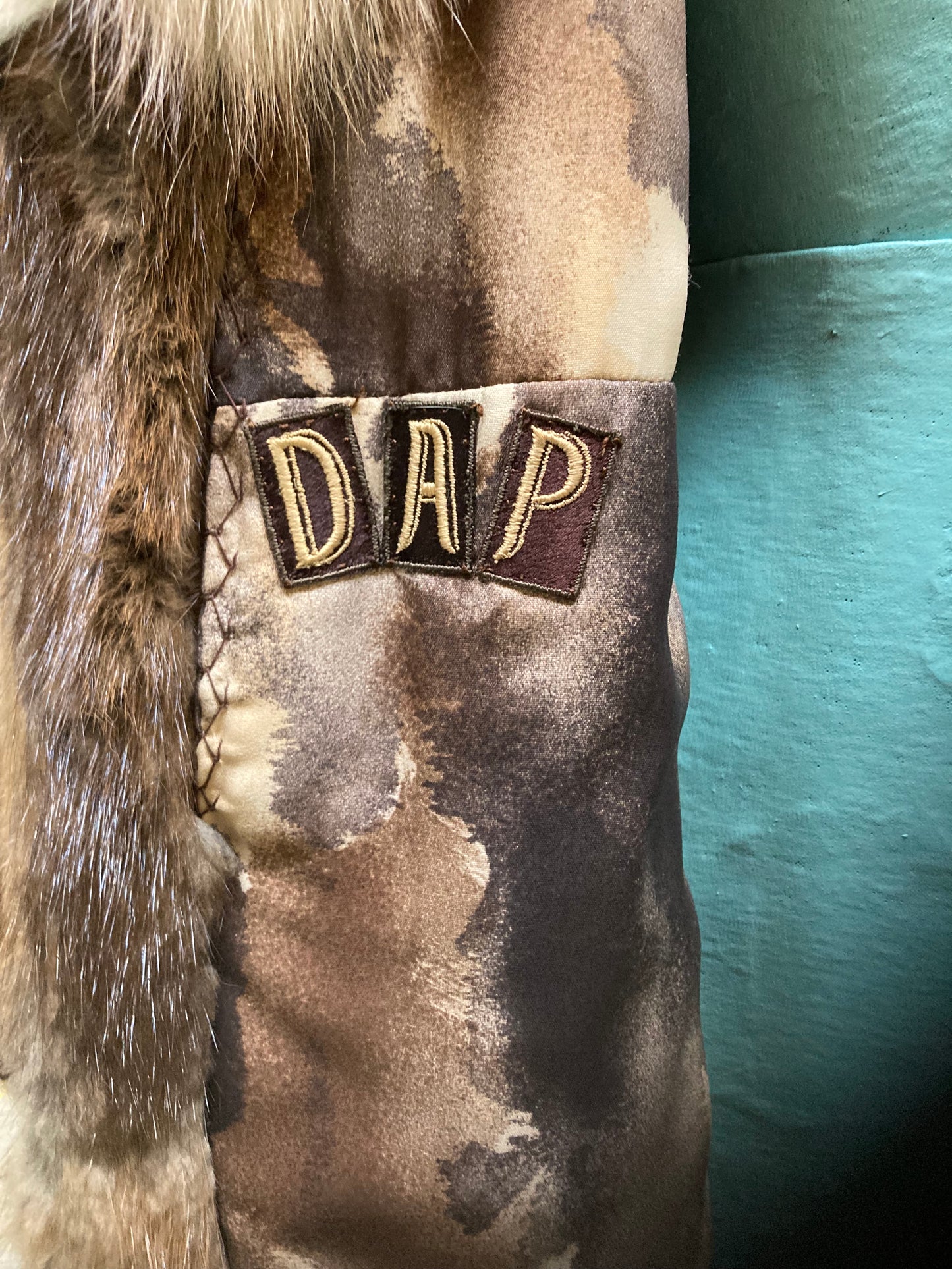 Kingspier Vintage - Vintage 70’s Mitchell Fur Co. Fur Coat features an exaggerated fur collar, double breasted button closures, D,A,P monogram and a bottom portion that zips off to give the option of a shorter jacket.
Made in Canada.