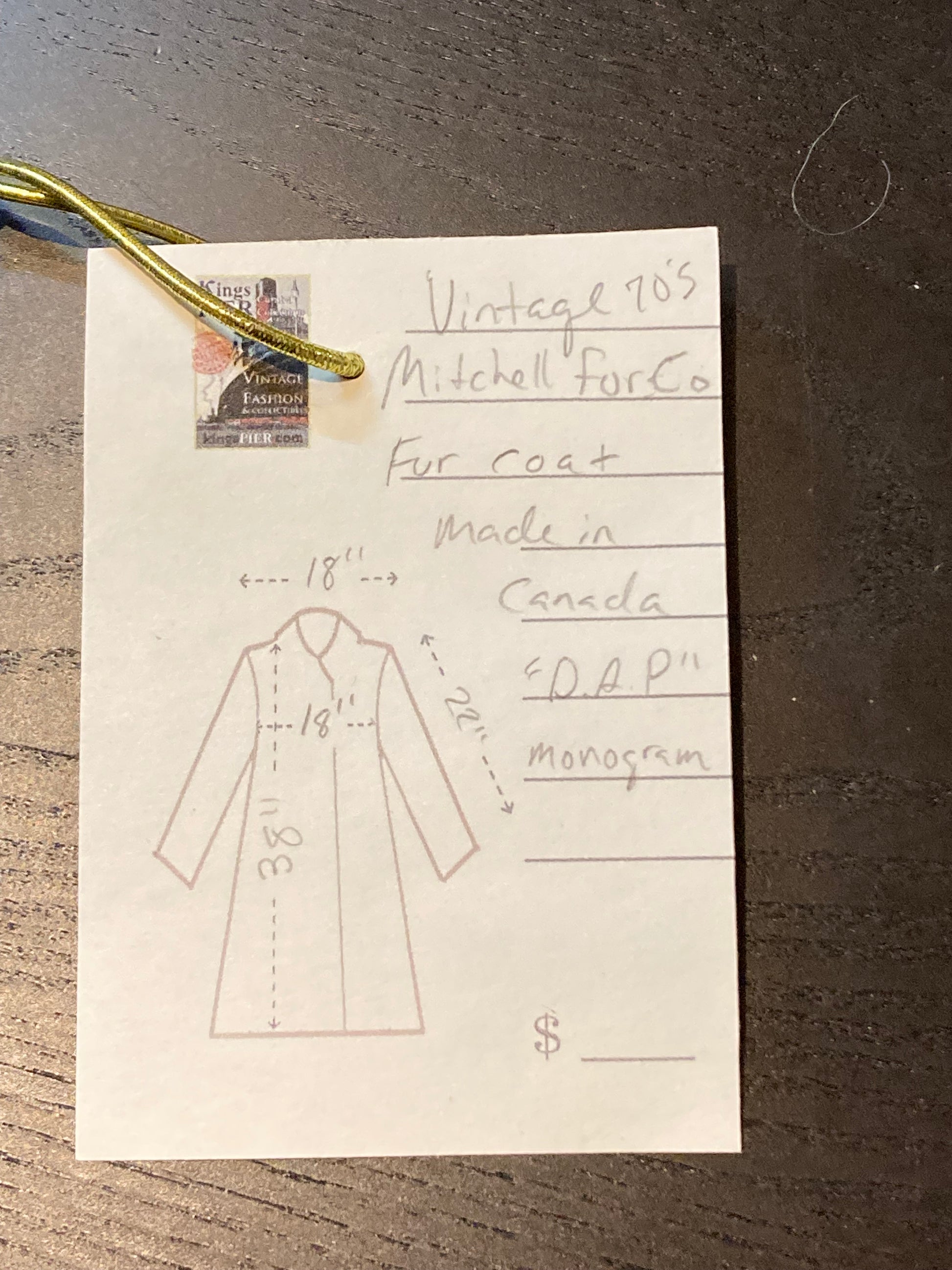 Kingspier Vintage - Vintage 70’s Mitchell Fur Co. Fur Coat features an exaggerated fur collar, double breasted button closures, D,A,P monogram and a bottom portion that zips off to give the option of a shorter jacket.
Made in Canada.