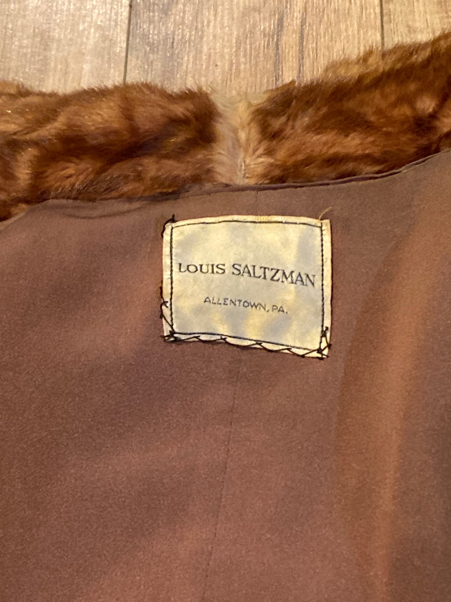 Kingspier Vintage - Vintage Louis Saltzman fur opera coat with hook and eye closures and twp front pockets, one inside pocket.
Made in USA.