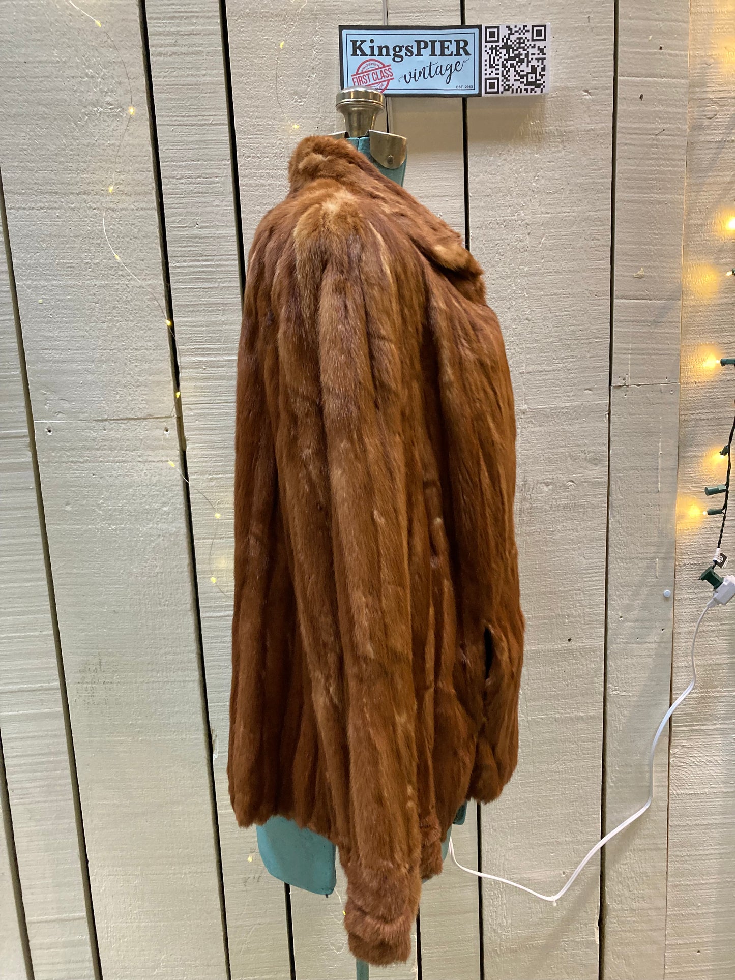 Kingspier Vintage - Vintage Louis Saltzman fur opera coat with hook and eye closures and twp front pockets, one inside pocket.
Made in USA.