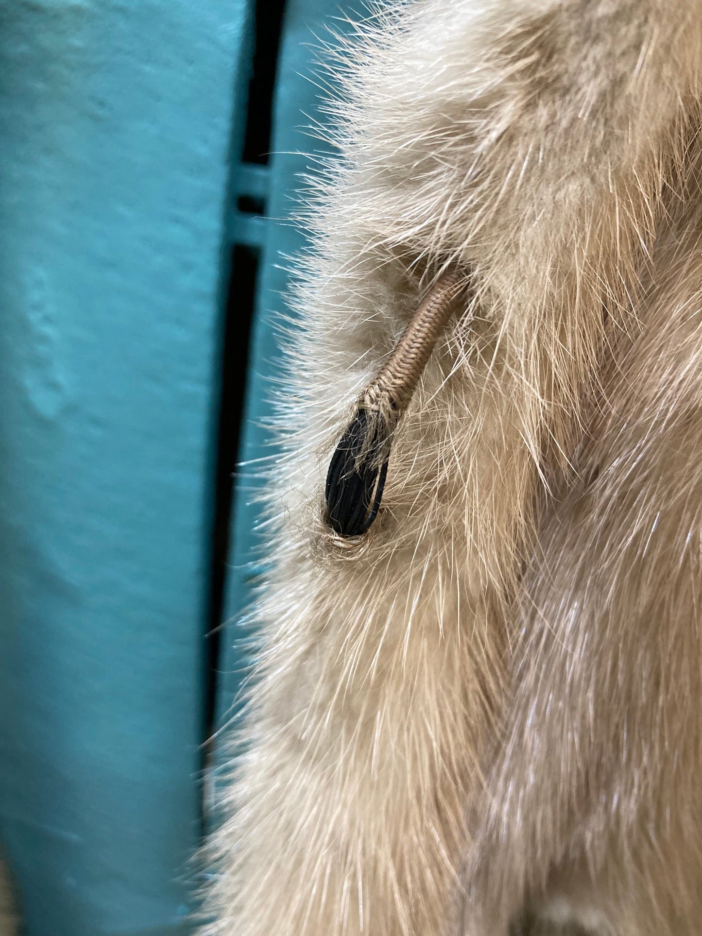 Kingspier Vintage - Vintage silver 70's fur coat with hook and eye closures and two front pockets.
No manufacturer's details.