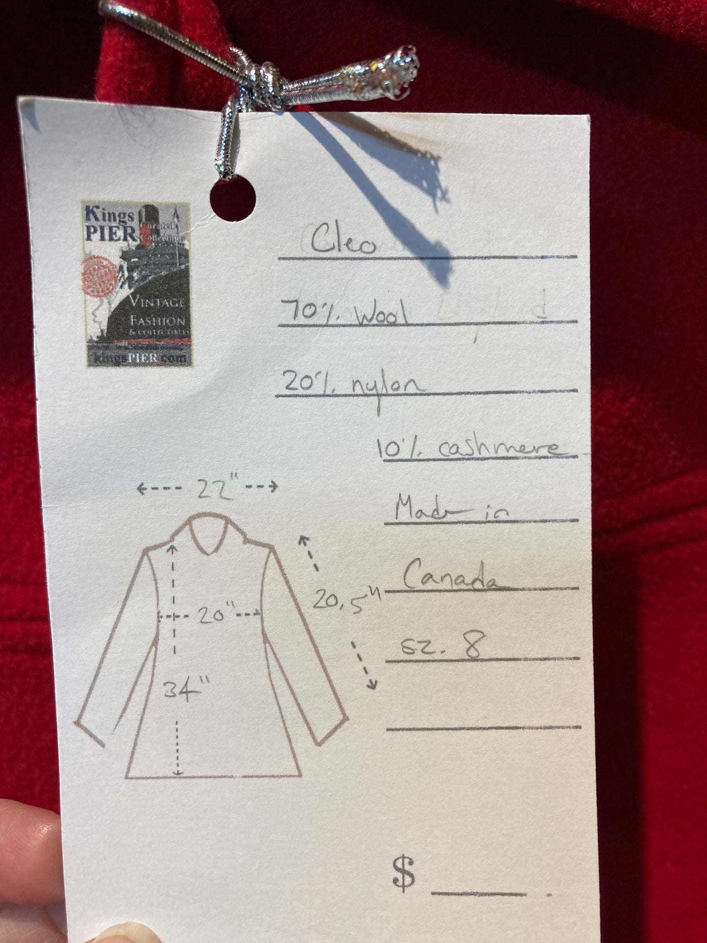 Kingspier Vintage - Cleo bright red wool blend (70% wool, 20% nylon, 10% cashmere) with button closures and patch pockets.
Made in Canada.
Size 8.