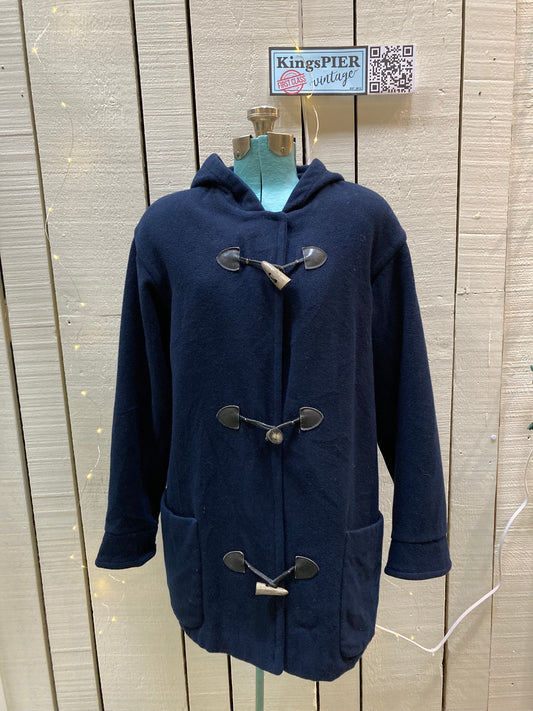Kingspier Vintage - Eddie Bauer blue duffle coat with hood, antler toggle closures and front patch pockets. Fibres unknown.
Size Small