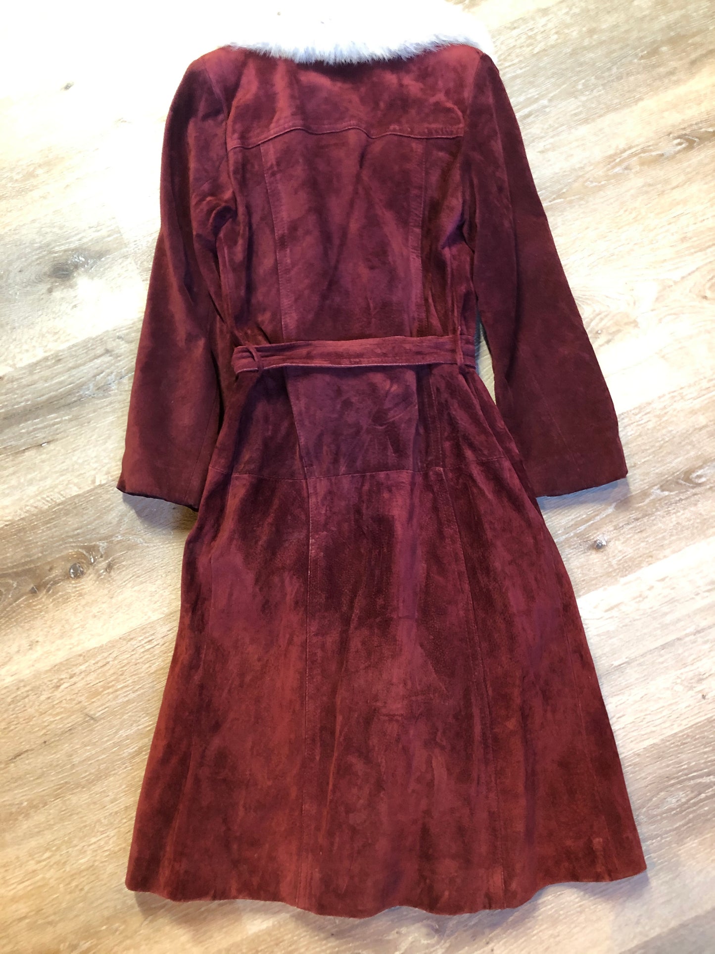 Kingspier Vintage - Leather Attic 1970’s oxblood suede coat with fur collar. Beautifully fitted, the coat features pockets, buttons, a belt and a quilted lining. Made in Canada. Size small.