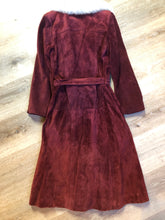 Load image into Gallery viewer, Kingspier Vintage - Leather Attic 1970’s oxblood suede coat with fur collar. Beautifully fitted, the coat features pockets, buttons, a belt and a quilted lining. Made in Canada. Size small.
