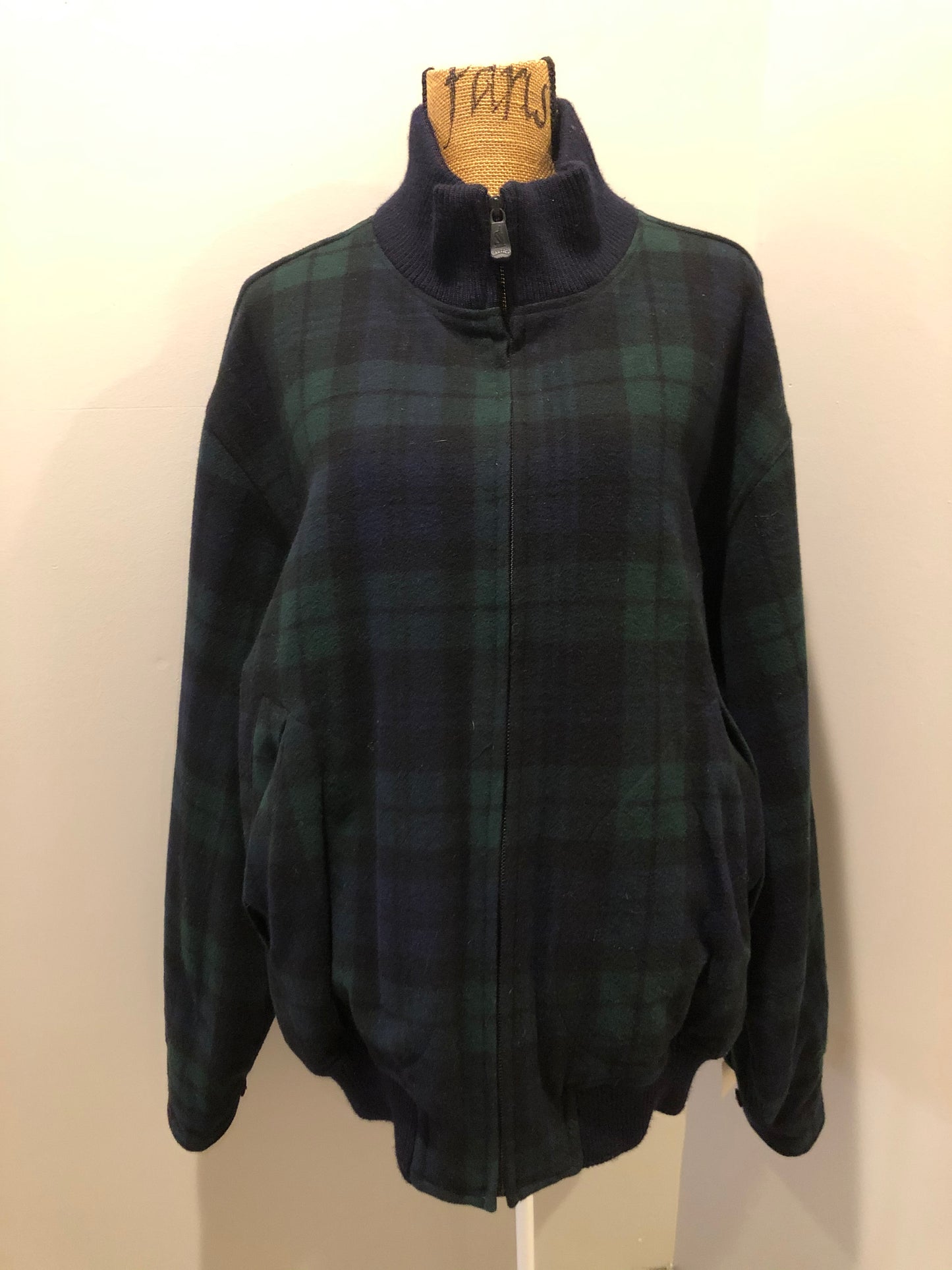 Kingspier Vintage - Nautica green and black “black watch” tartan wool jacket with knit trim collar, zipper, slash pockets and quilted lining. Size XL.