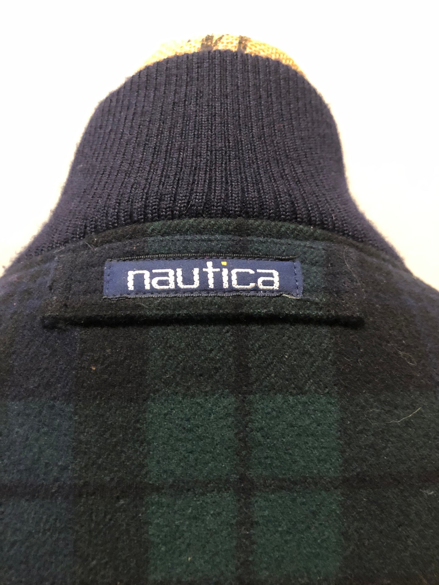 Kingspier Vintage - Nautica green and black “black watch” tartan wool jacket with knit trim collar, zipper, slash pockets and quilted lining. Size XL.