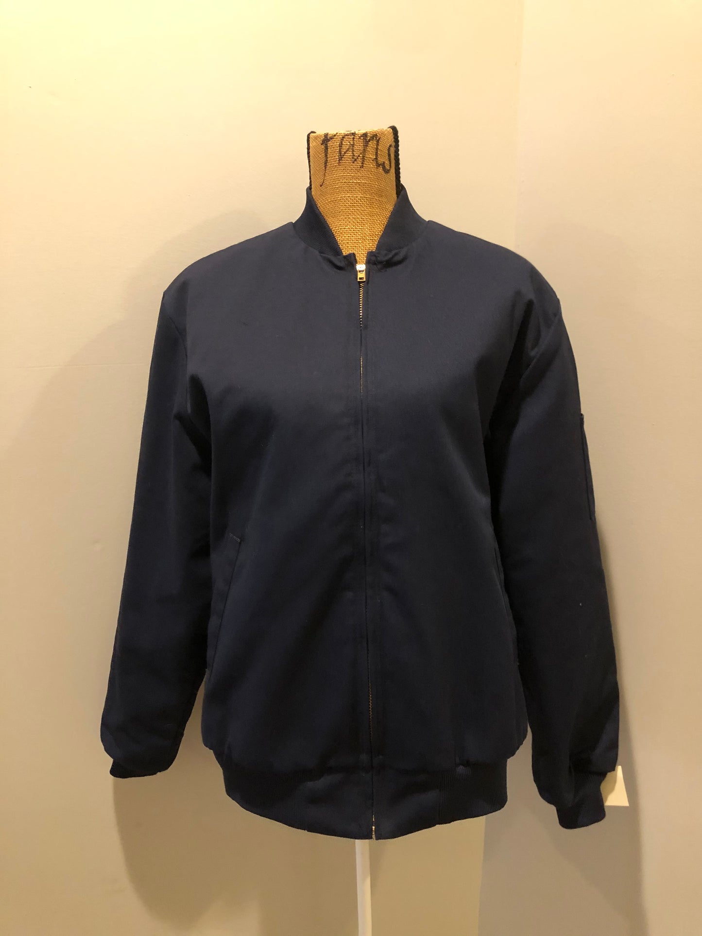 Kingspier Vintage - Red Kap bomber jacket in navy with knit collar and cuffs, zipper, slash pockets, and quilted lining. Made in the USA.