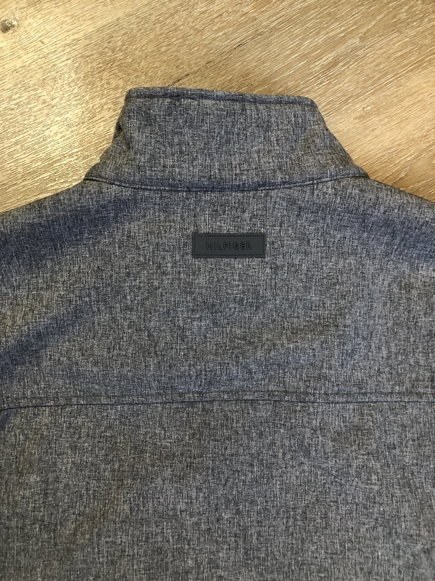 Kingspier Vintage - Tommy Hilfiger grey jacket with zipper, front slash pockets and inside pocket.