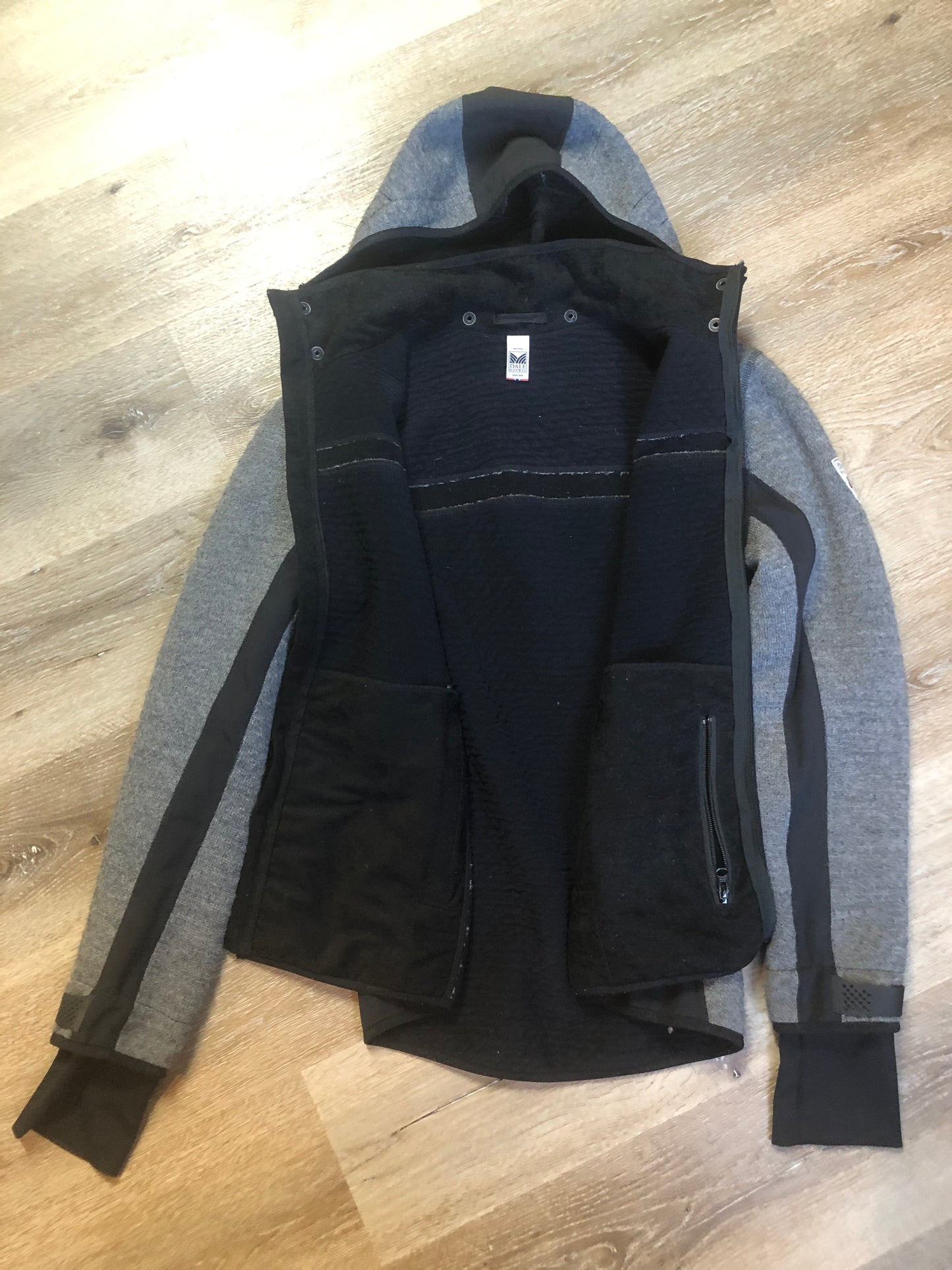 Kingspier Vintage - Dale of Norway weatherproof grey and black treated wool jacket with zipper, vertical pockets, thumb hole details, detachable hood and Dale of Norway crest on shoulder.