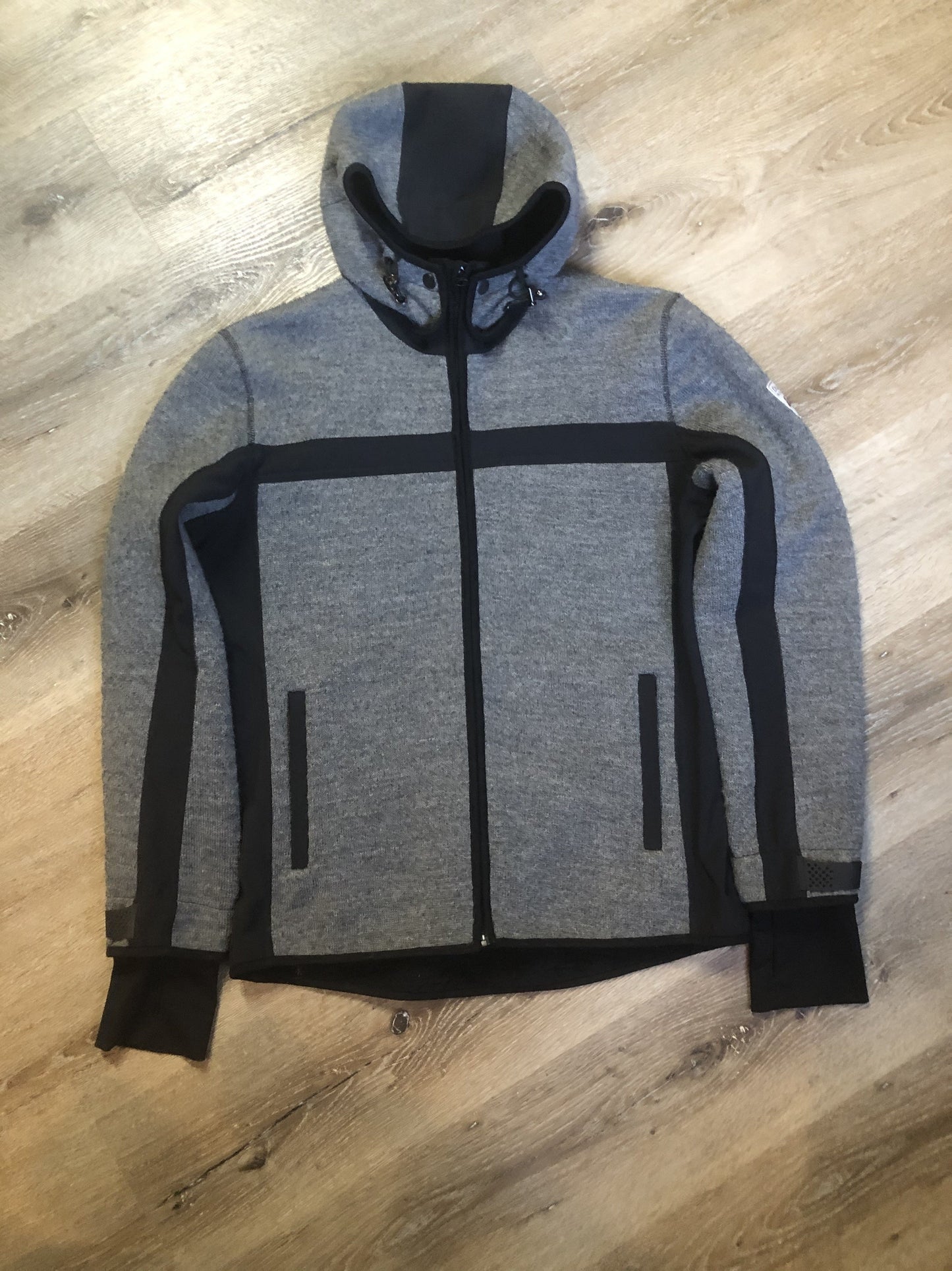 Kingspier Vintage - Dale of Norway weatherproof grey and black treated wool jacket with zipper, vertical pockets, thumb hole details, detachable hood and Dale of Norway crest on shoulder.