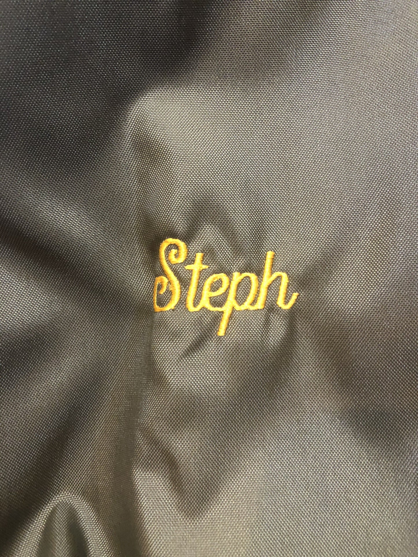 Kingspier Vintage - Havenhill High Soccer varsity jacket in brown with yellow stripe, zipper, front pouch pocket, “Havenhill High” written across the back and “Steph” monogram on the arm. Made in the USA. Size large.