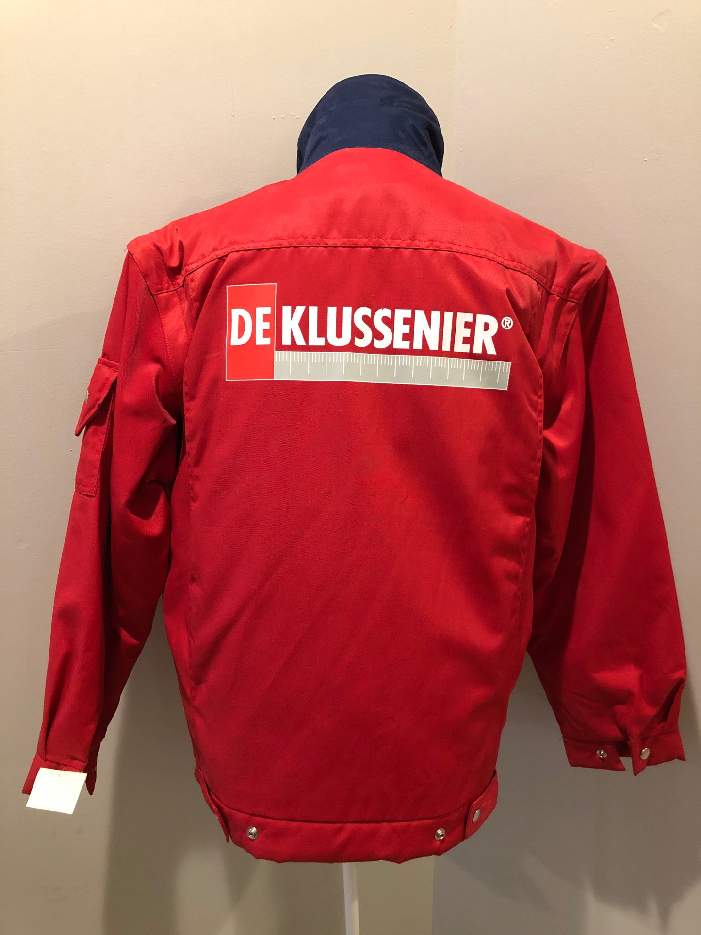Kingspier Vintage - Deklussenier red jacket with funnel neck, zipper and snap closures, snap closures at wrist and waist, two top flap pockets and two slash pockets, zip off sleeves and zip out quilted lining. Size S.