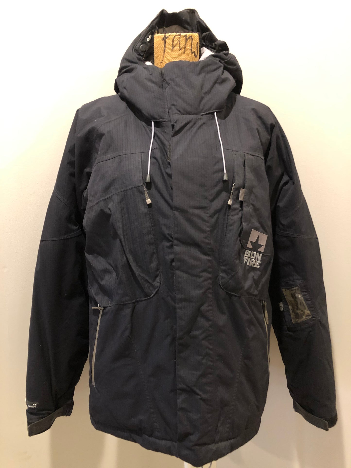 Kingspier Vintage - Bonfire “Triumph” black down filled, waterproof ski jacket with waterproof zippers,sling shot hood adjust, season pass window, many well thought out outside and inside pockets for headphone, phone, goggles, Etc. Size medium.