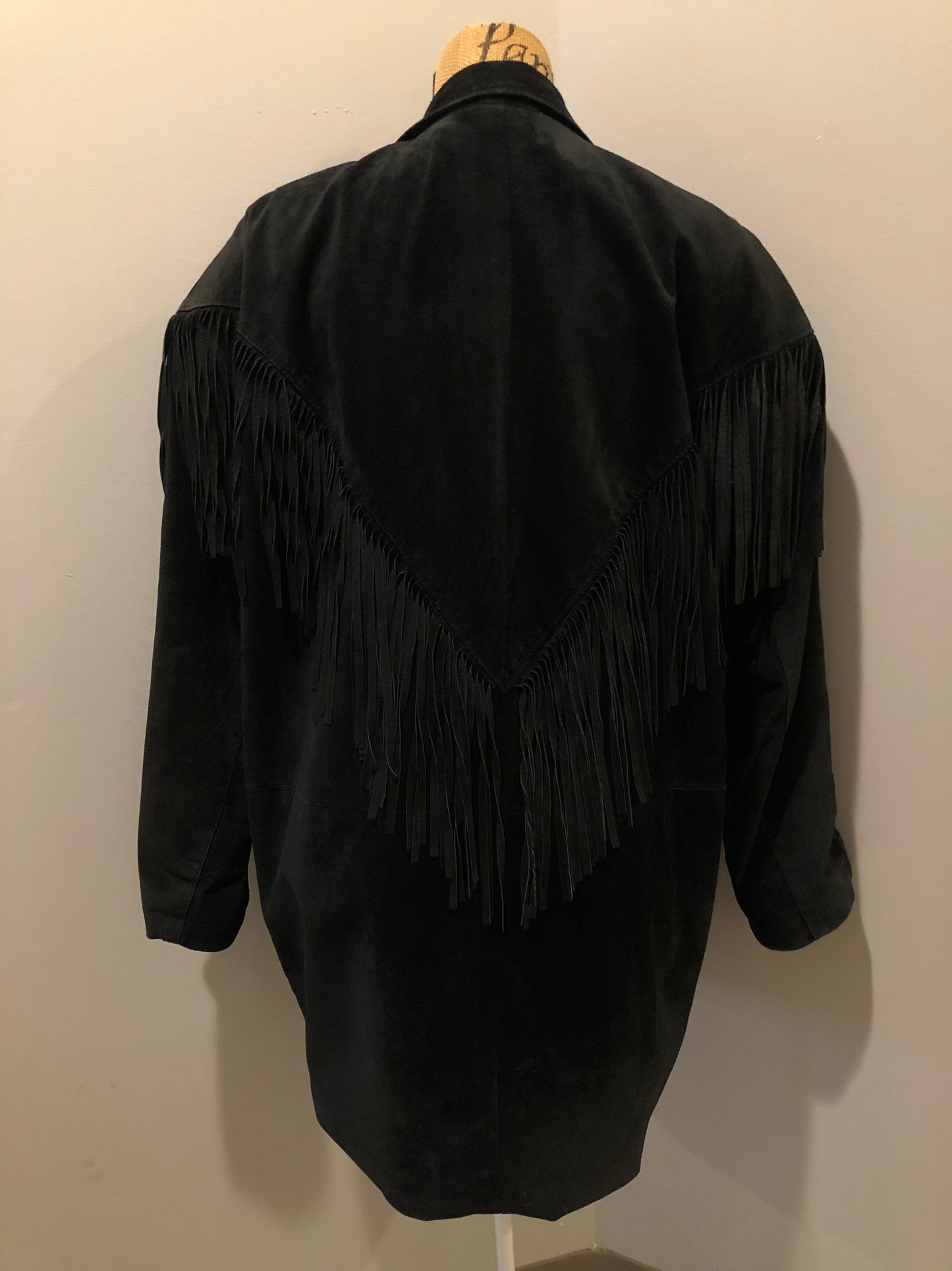 Kingspier Vintage - Laurence Roy black lamb leather suede jacket circa 1980’s with fringe detailing, button closures and slash pockets. Made in Canada. Size large.