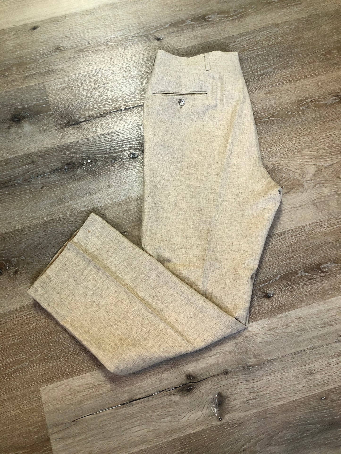 Kingspier Vintage - Chaps by Ralph Lauren light beige two piece suit at Martini Carl Boston. Jacket is a three button notch lapel with three flap pockets and a breast pocket. The pants are flat front with two slash pockets, a tiny flap pocket in the front and two back pockets.