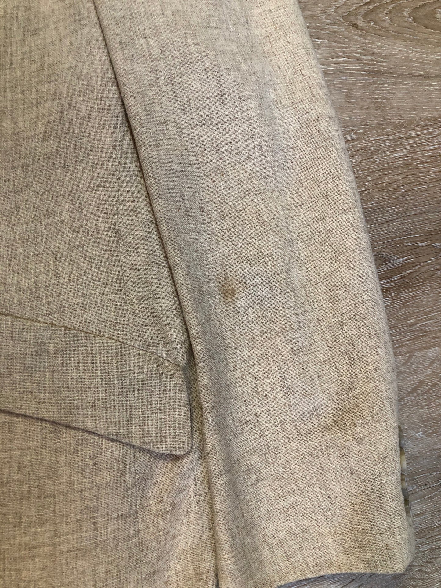 Kingspier Vintage - Chaps by Ralph Lauren light beige two piece suit at Martini Carl Boston. Jacket is a three button notch lapel with three flap pockets and a breast pocket. The pants are flat front with two slash pockets, a tiny flap pocket in the front and two back pockets.