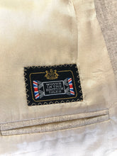Load image into Gallery viewer, Kingspier Vintage - Chaps by Ralph Lauren light beige two piece suit  at Martini Carl Boston. Jacket is a three button notch lapel with three flap pockets and a breast pocket. The pants are flat front with two slash pockets, a tiny flap pocket in the front and two back pockets.
