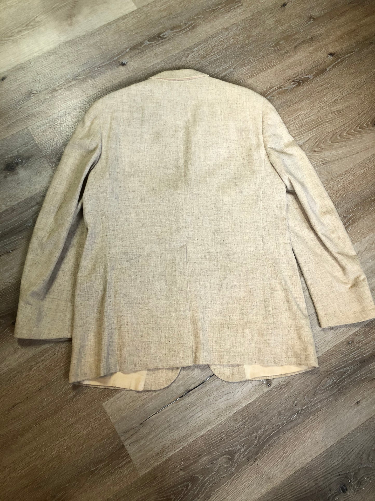 Kingspier Vintage - Chaps by Ralph Lauren light beige two piece suit at Martini Carl Boston. Jacket is a three button notch lapel with three flap pockets and a breast pocket. The pants are flat front with two slash pockets, a tiny flap pocket in the front and two back pockets.