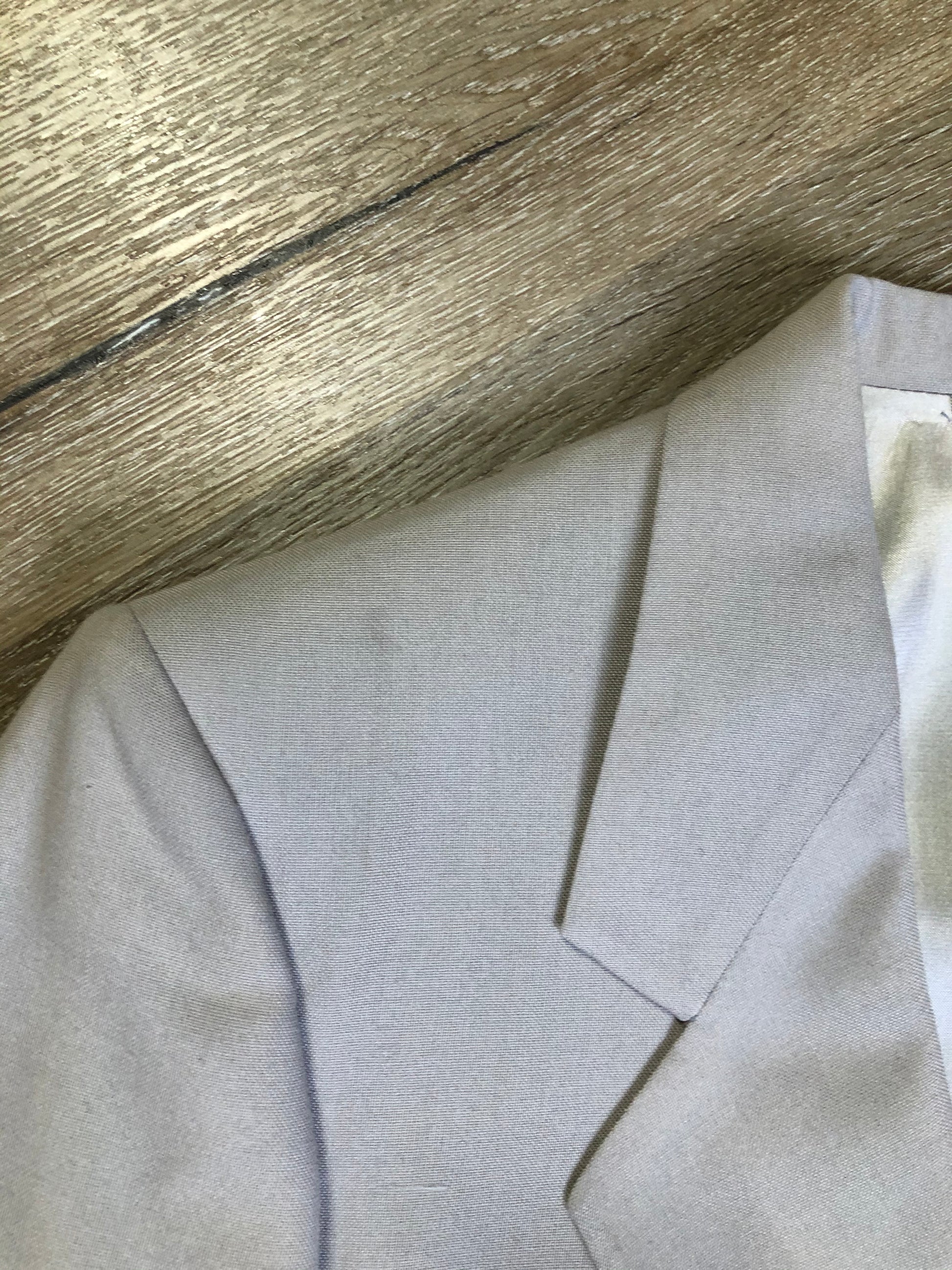 Kingspier Vintage - Georgio De Medici beige wool blend two piece suit,  at R.W. Phinney Ltd - Cornwallis Clothes in Kentville, NS. The jacket is a two button notch lapel with two flap pockets, a breast pocket and three inside pockets. The pants are pleated with two front slash pockets and two welt pockets in the back.