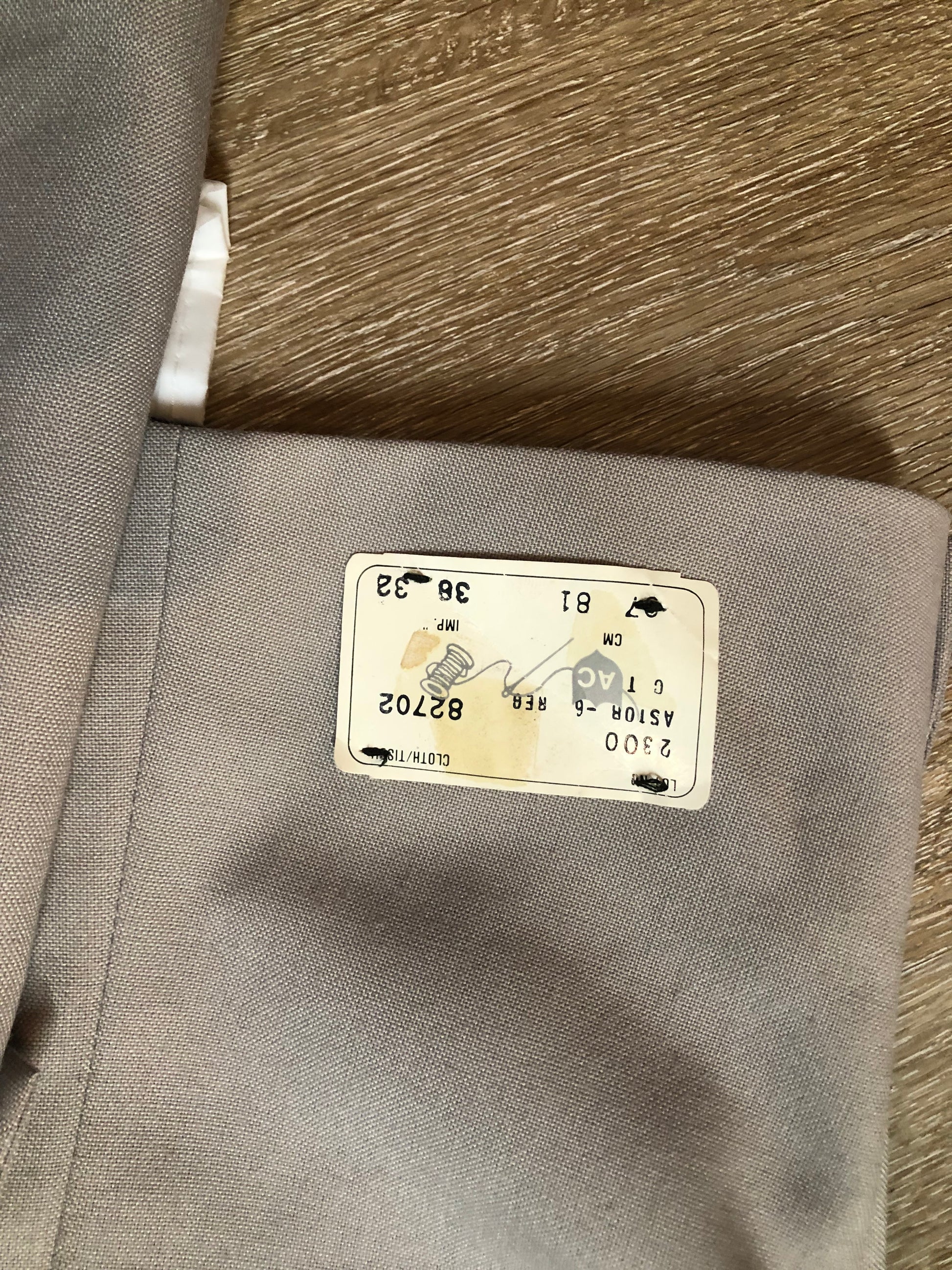 Kingspier Vintage - Georgio De Medici beige wool blend two piece suit,  at R.W. Phinney Ltd - Cornwallis Clothes in Kentville, NS. The jacket is a two button notch lapel with two flap pockets, a breast pocket and three inside pockets. The pants are pleated with two front slash pockets and two welt pockets in the back.