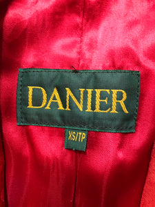 Kingspier Vintage - Danier red suede jacket with fitted silhouette, three gold decorative buttons and two slanted welt pockets. Size small.