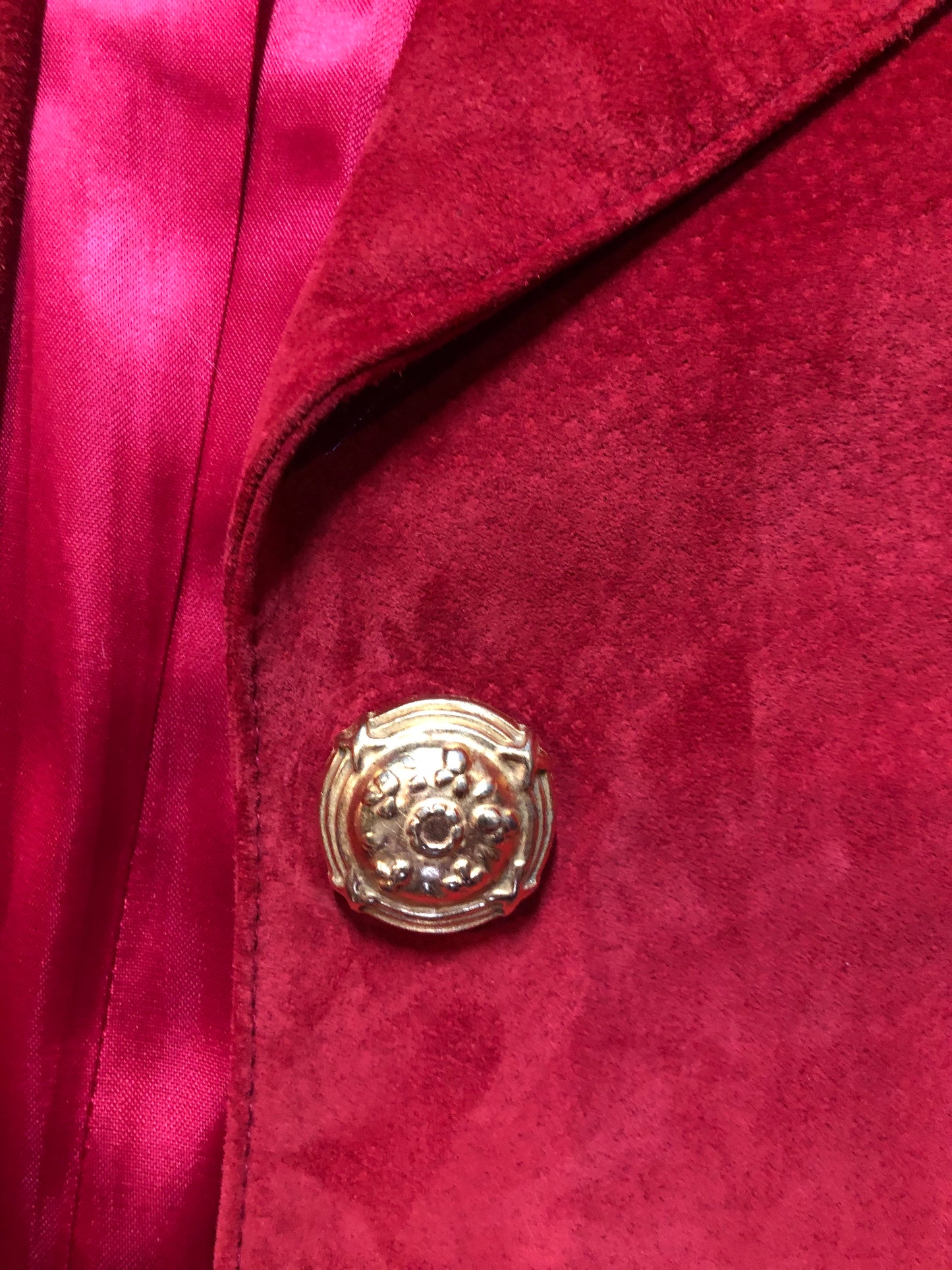 Kingspier Vintage - Danier red suede jacket with fitted silhouette, three gold decorative buttons and two slanted welt pockets. Size small.