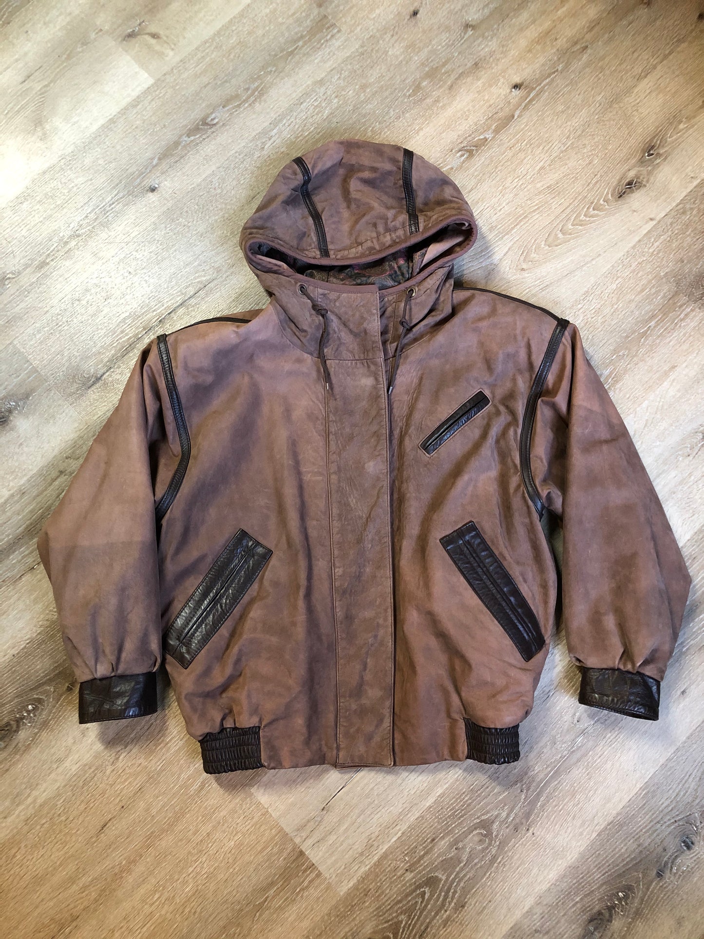 Kingspier Vintage - J. Percy for Marvin Richards 1980’s/1990’s brown nubuck leather jacket with dark brown leather details, hood, zipper and snap closures and paisley lining. Made in the USA. Size small.