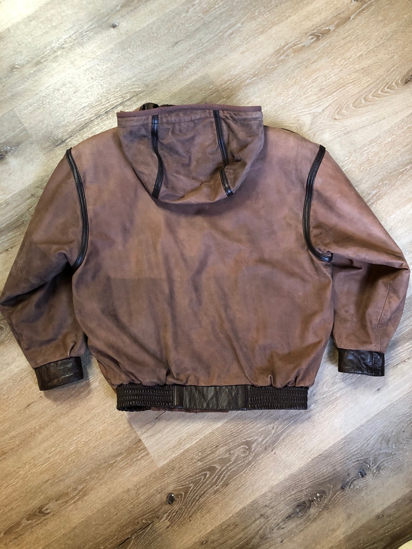 Kingspier Vintage - J. Percy for Marvin Richards 1980’s/1990’s brown nubuck leather jacket with dark brown leather details, hood, zipper and snap closures and paisley lining. Made in the USA. Size small.