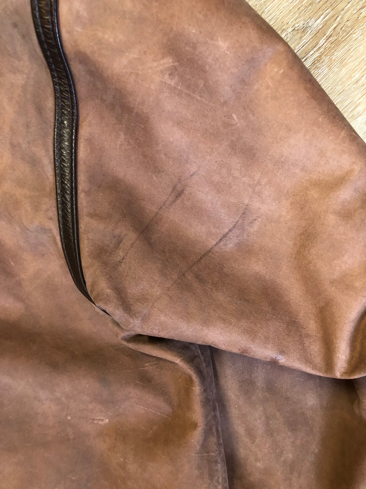 Kingspier Vintage - J. Percy for Marvin Richards 1980’s/1990’s brown nubuck leather jacket with dark brown leather details, hood, zipper and snap closures and paisley lining. Made in the USA. Size small.