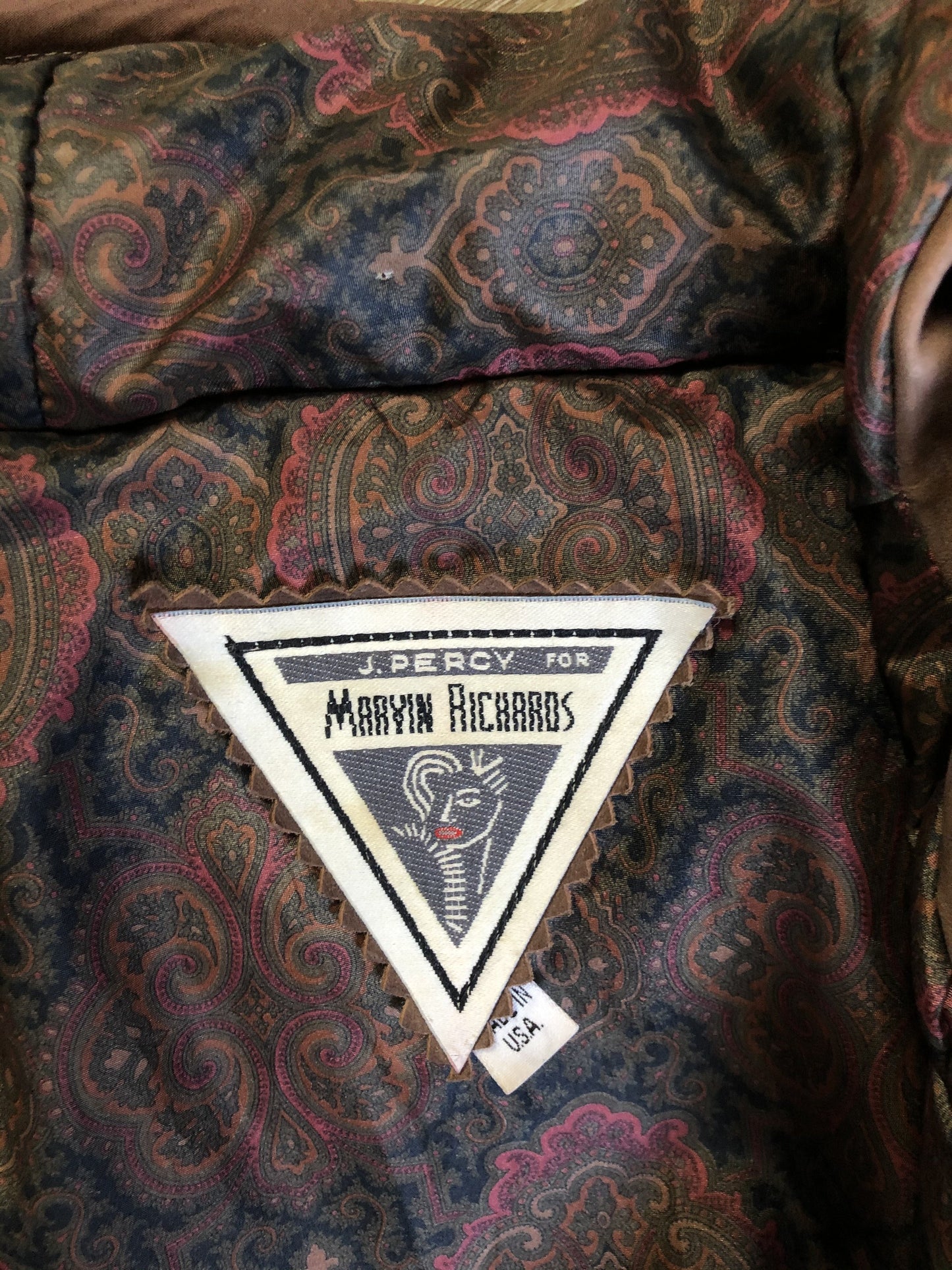 Kingspier Vintage - J. Percy for Marvin Richards 1980’s/1990’s brown nubuck leather jacket with dark brown leather details, hood, zipper and snap closures and paisley lining. Made in the USA. Size small.