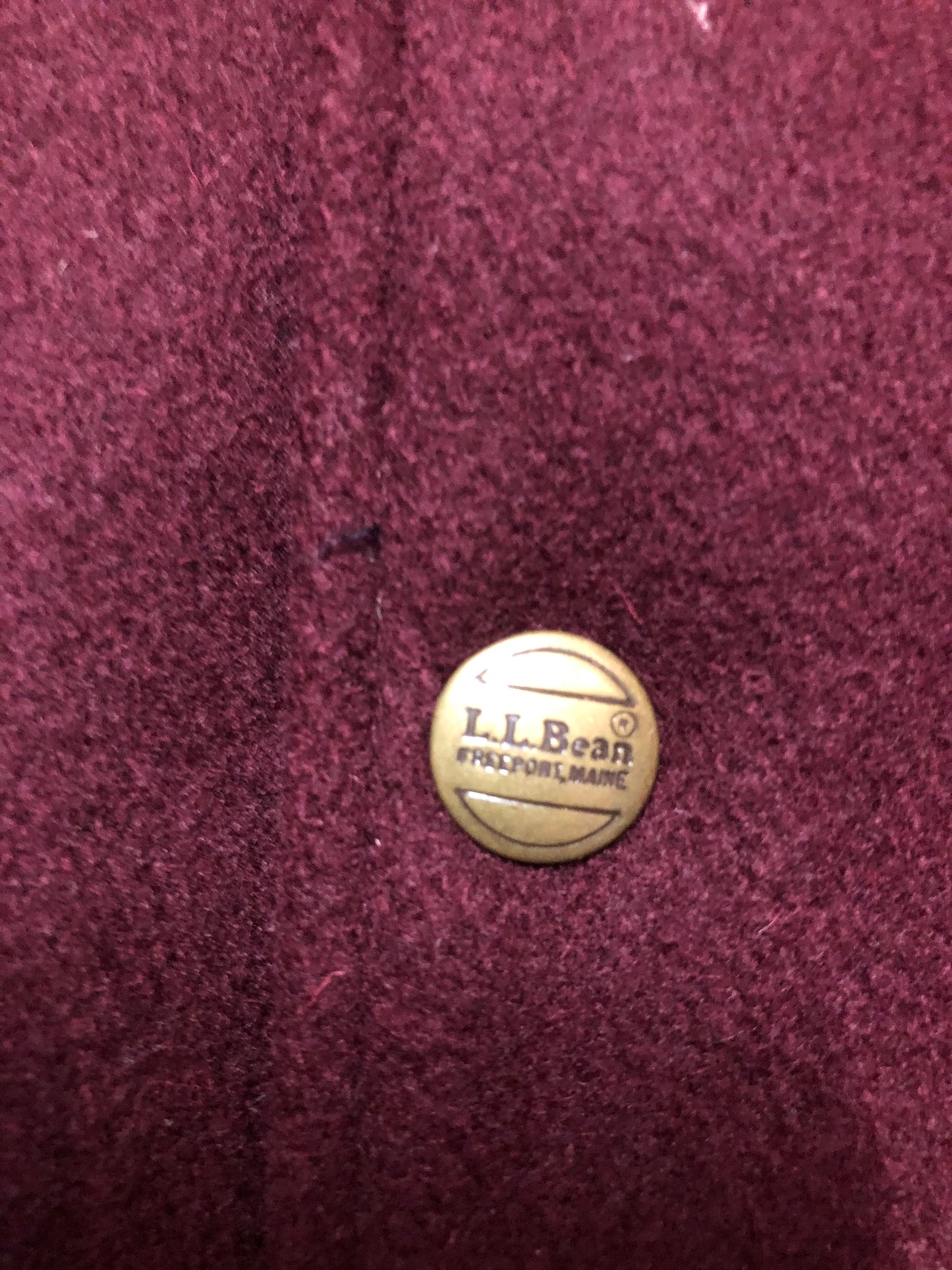 Kingspier Vintage - L.L.Bean bomber jacket in wine with snap closures with logo, knit trim and slash pockets. Size large.