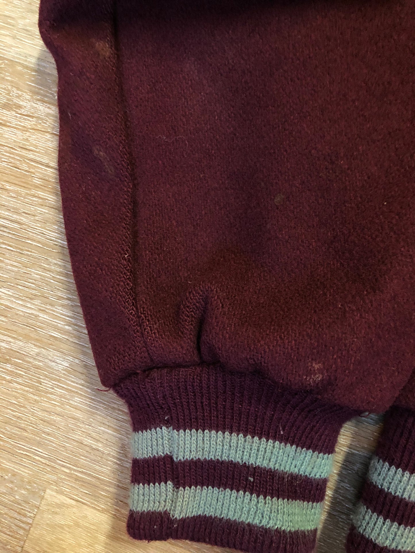Kingspier Vintage - L.L.Bean bomber jacket in wine with snap closures with logo, knit trim and slash pockets. Size large.