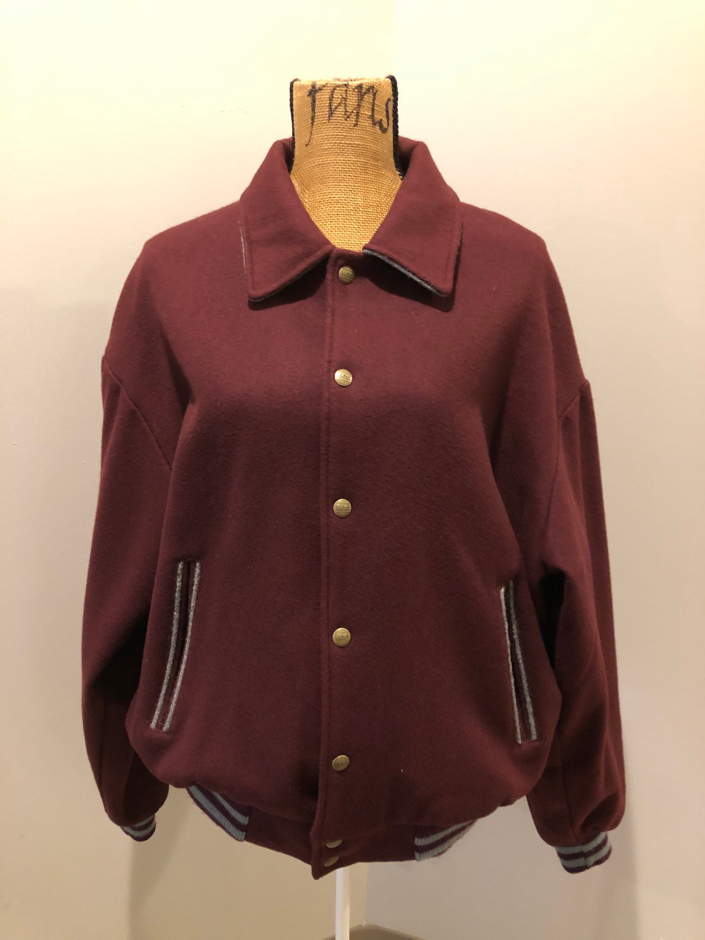 Kingspier Vintage - L.L.Bean bomber jacket in wine with snap closures with logo, knit trim and slash pockets. Size large.