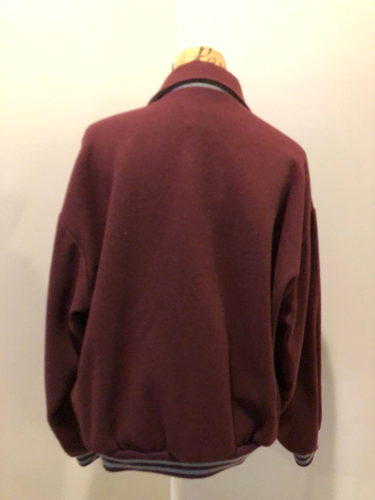 Kingspier Vintage - L.L.Bean bomber jacket in wine with snap closures with logo, knit trim and slash pockets. Size large.