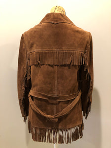 Kingspier Vintage - Jonathan Legault brown suede western style jacket with fringe details, belt in the back, button closures and slash pockets. 